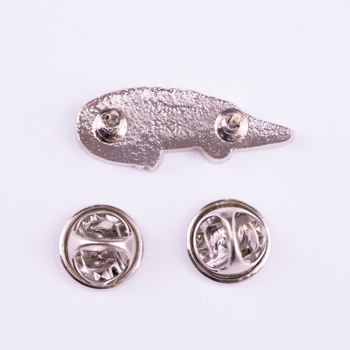 atras pin cocodrilo