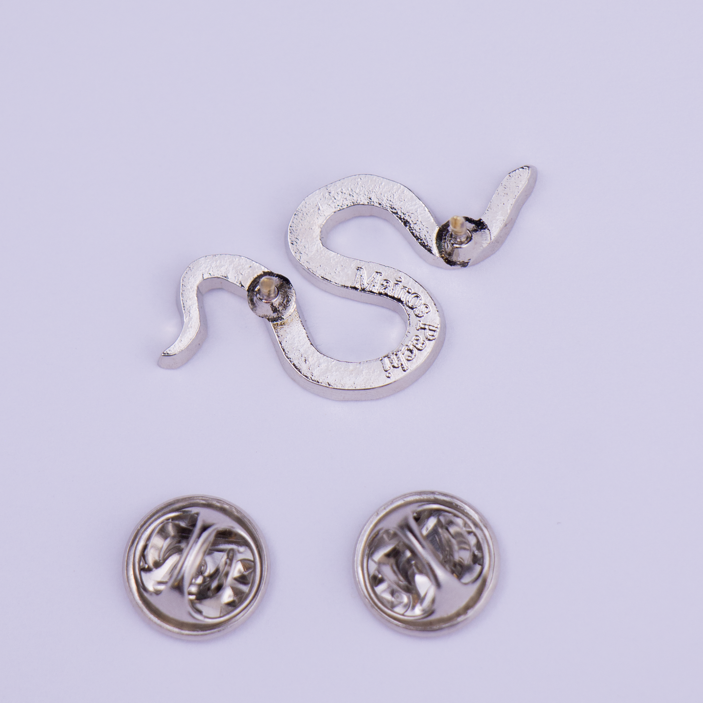 atras pin coralillo