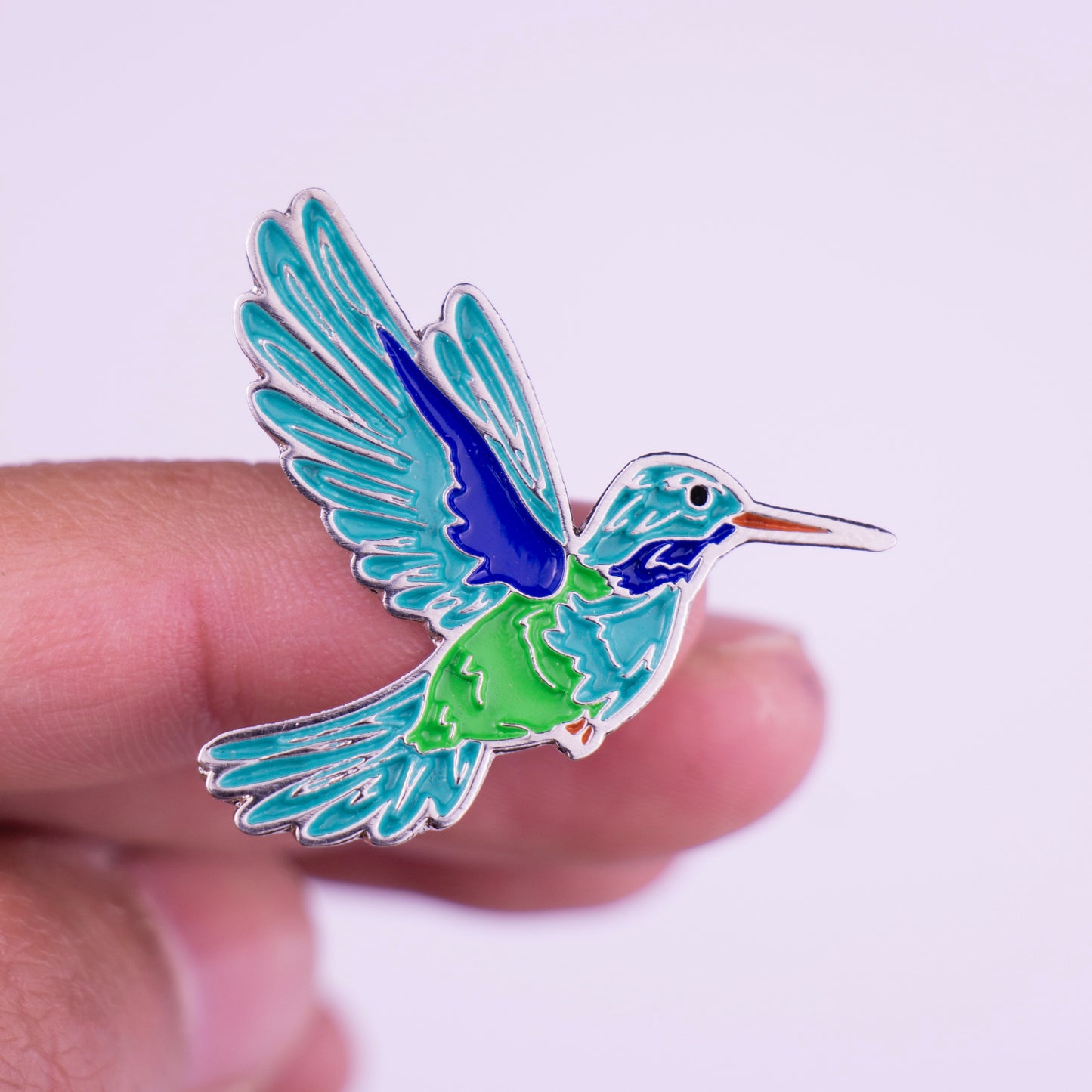 pin colibri mano