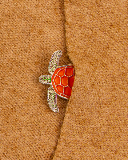 Pin de tortuga desovando