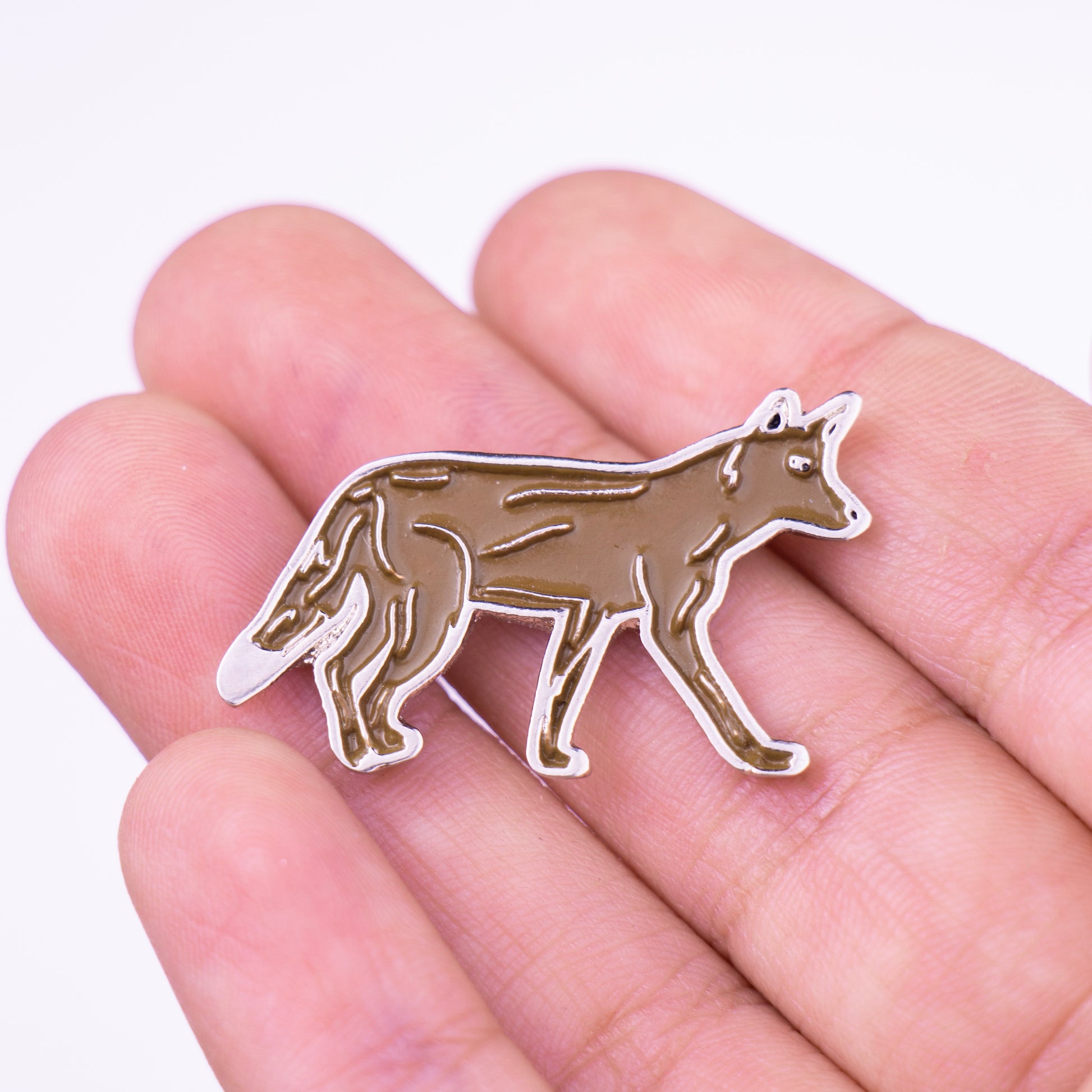 pin coyote mano